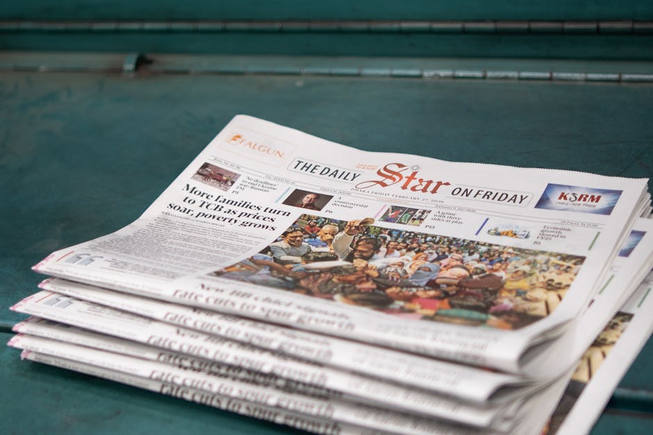 Stack of 'The Daily Star' newspapers showcasing a headline on rising poverty and price issues.